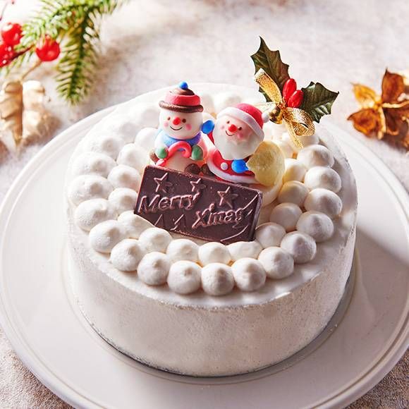 クリスマスのデコレーションケーキが置かれている