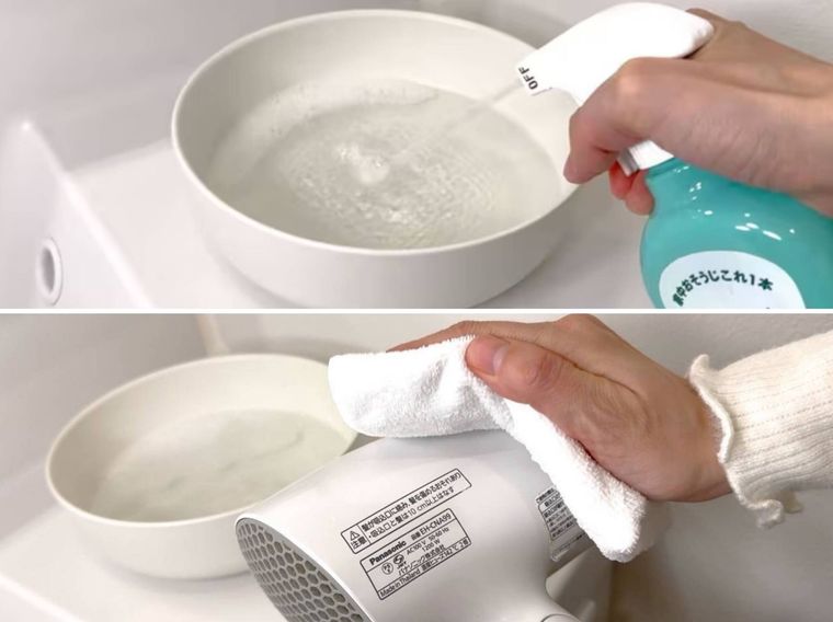 ドライヤーの本体を掃除している様子