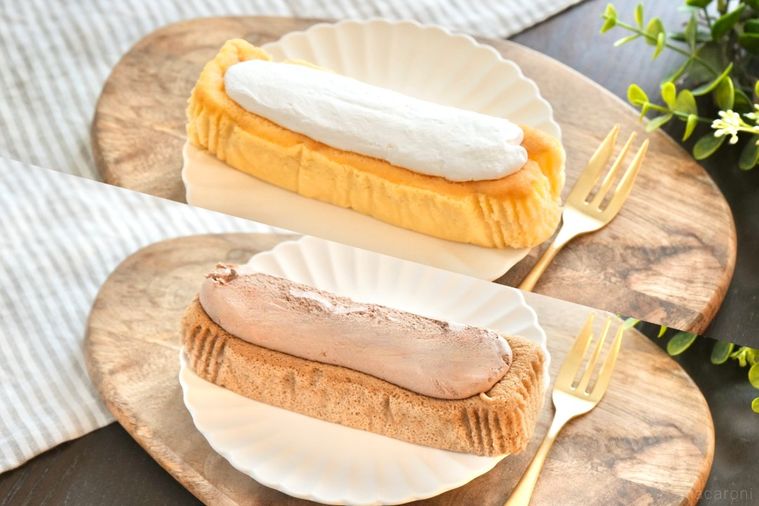 木のカッティングボードと白い皿にのったクリームのせ生シフォンと金のフォークとストライプの布