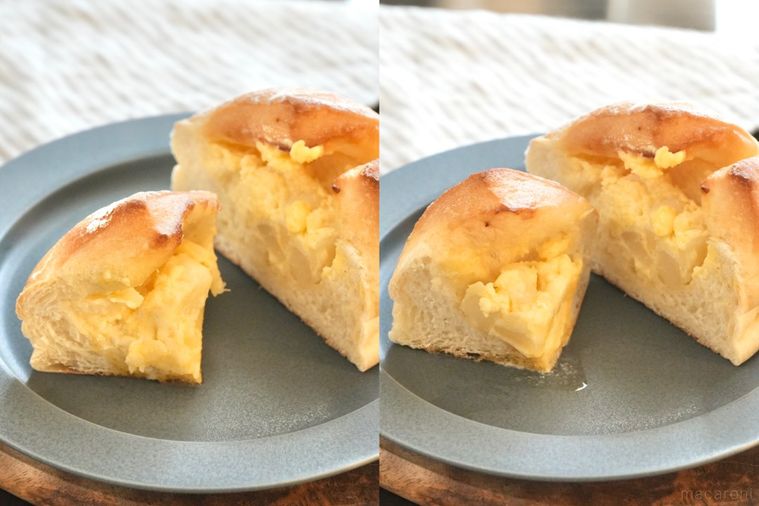 木のカッティングボードとグレーの皿にのったバターのせポテトフランスパンの断面とストライプの布