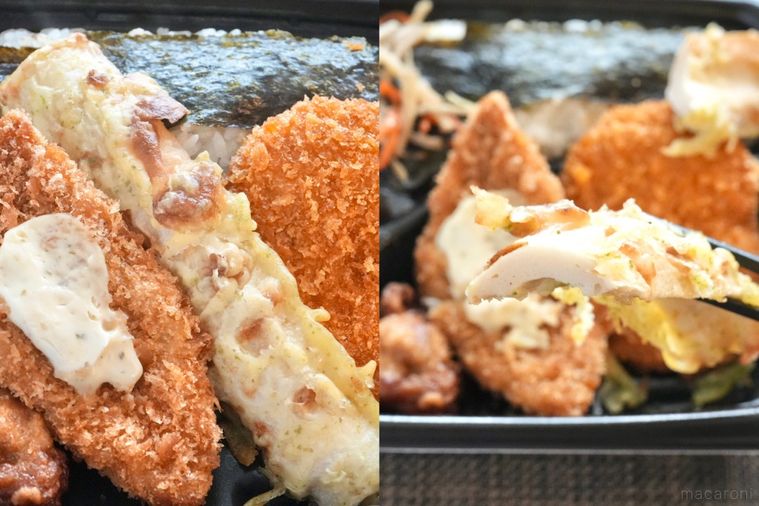 黒い容器に盛られたのり弁の白身魚のフライとちくわの磯辺揚げを黒い箸で持ち上げる様子