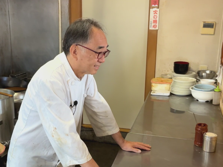 富富の歴史を語る安田晃さん