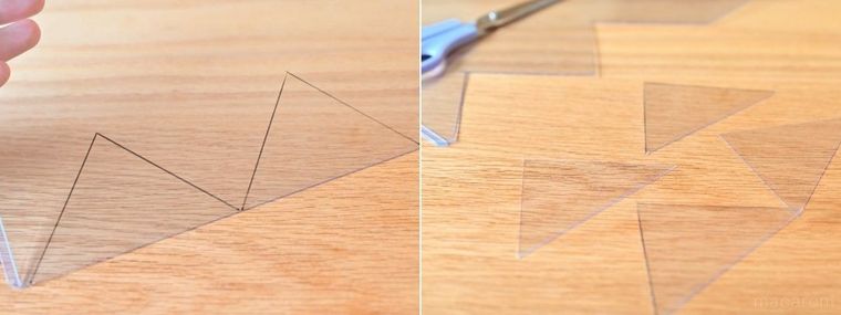 クリア板に描いた三角形を切っている