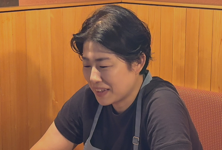 取材を受ける西さん