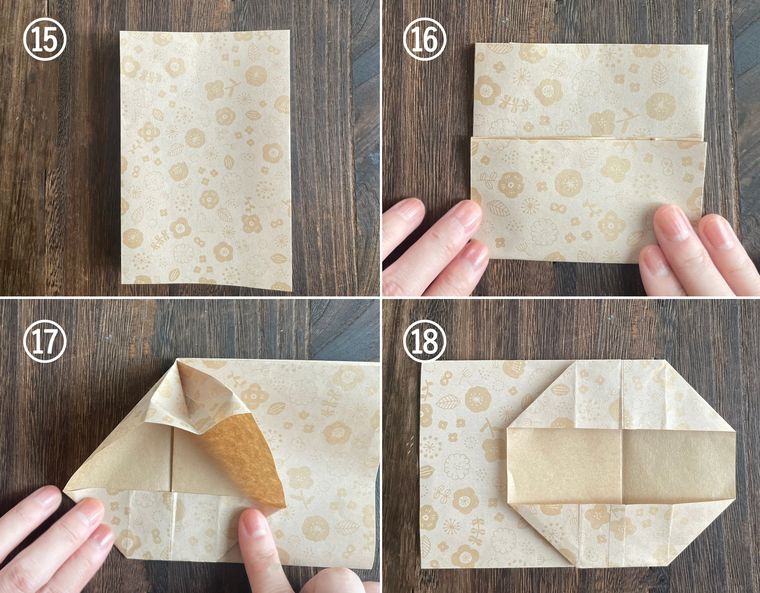 折り紙を折って紙袋を作っている写真