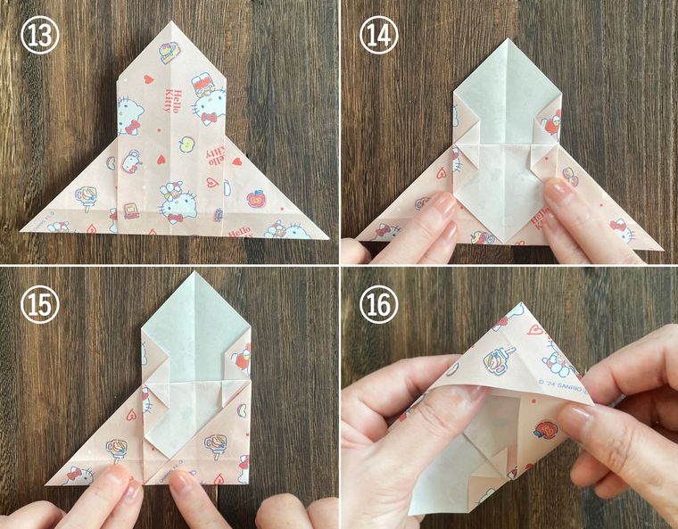 折り紙を折って紙袋を作っている写真