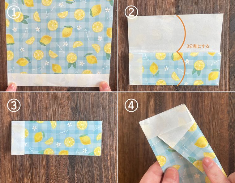 折り紙を折って紙袋を作っている写真