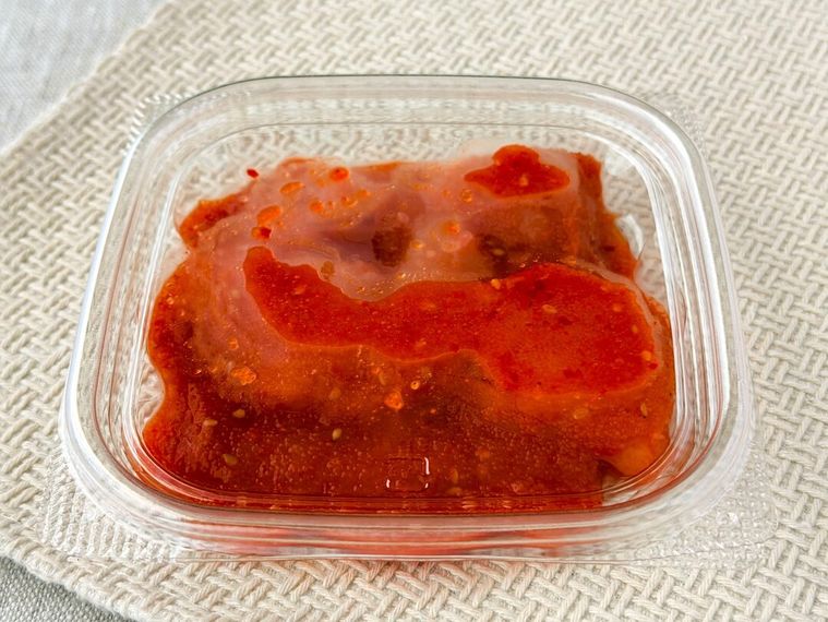 透明ケースに入った成城石井 たらこキムチ 100g