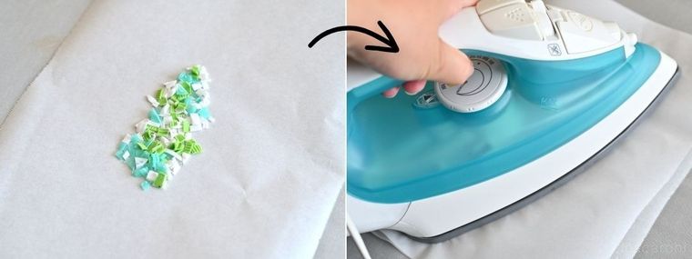 ペットボトルキャップのフレークをアイロンで溶かしている