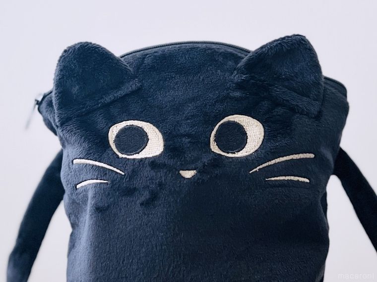 カルディのニャップザックの顔アップ