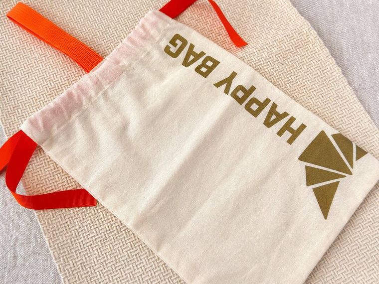 サンマルクカフェ福袋のオリジナル巾着が置かれている様子