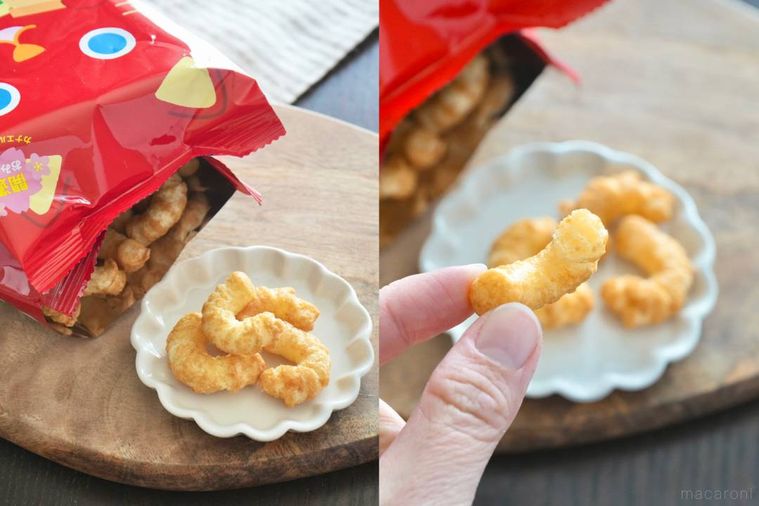 木のカッティングボードと白い小皿にのった招き猫の限定パッケージのキャラメルコーン