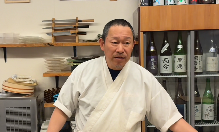 インタビューを受ける堀端さん