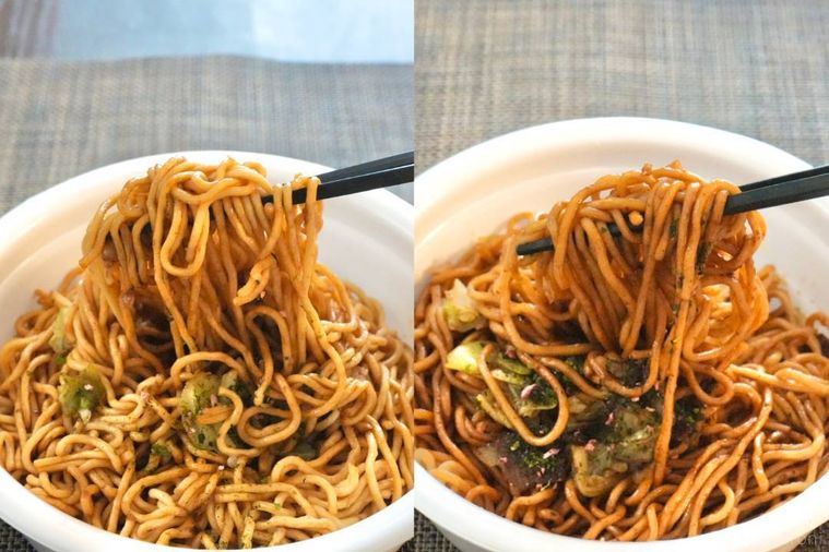 白いカップ容器から焼きそばを黒い箸で持ち上げる様子
