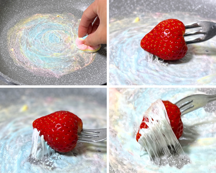 いちごに溶かしたマシュマロを絡めている様子