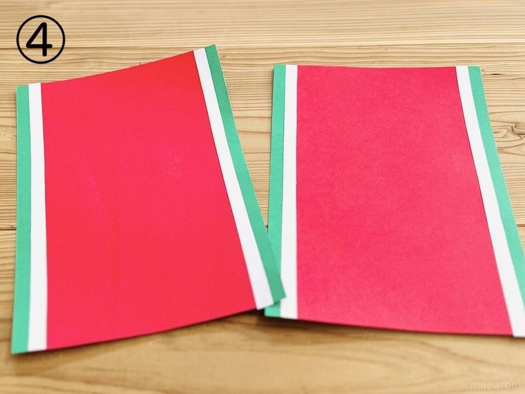 赤い画用紙に緑色の画用紙と白色の画用紙を貼り付けた様子