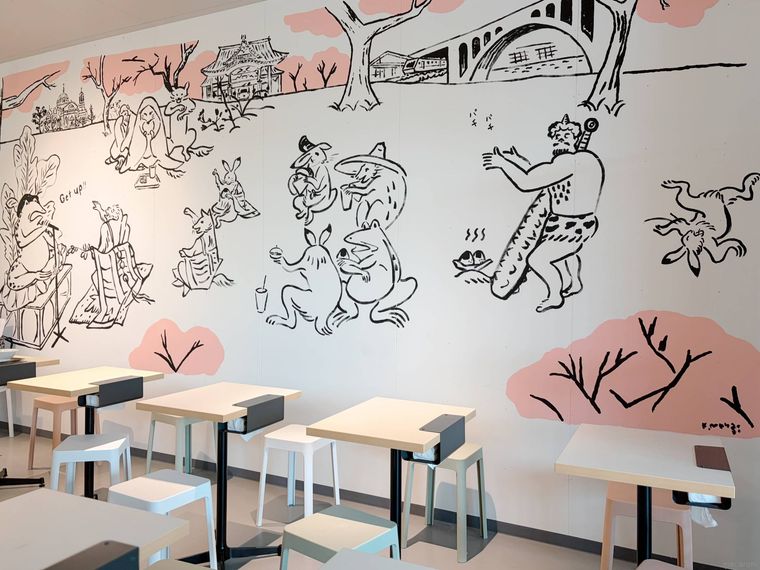 動物のイラストの描かれたおにどんの店内