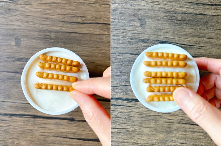 パルテノにココナッツサブレを刺す様子